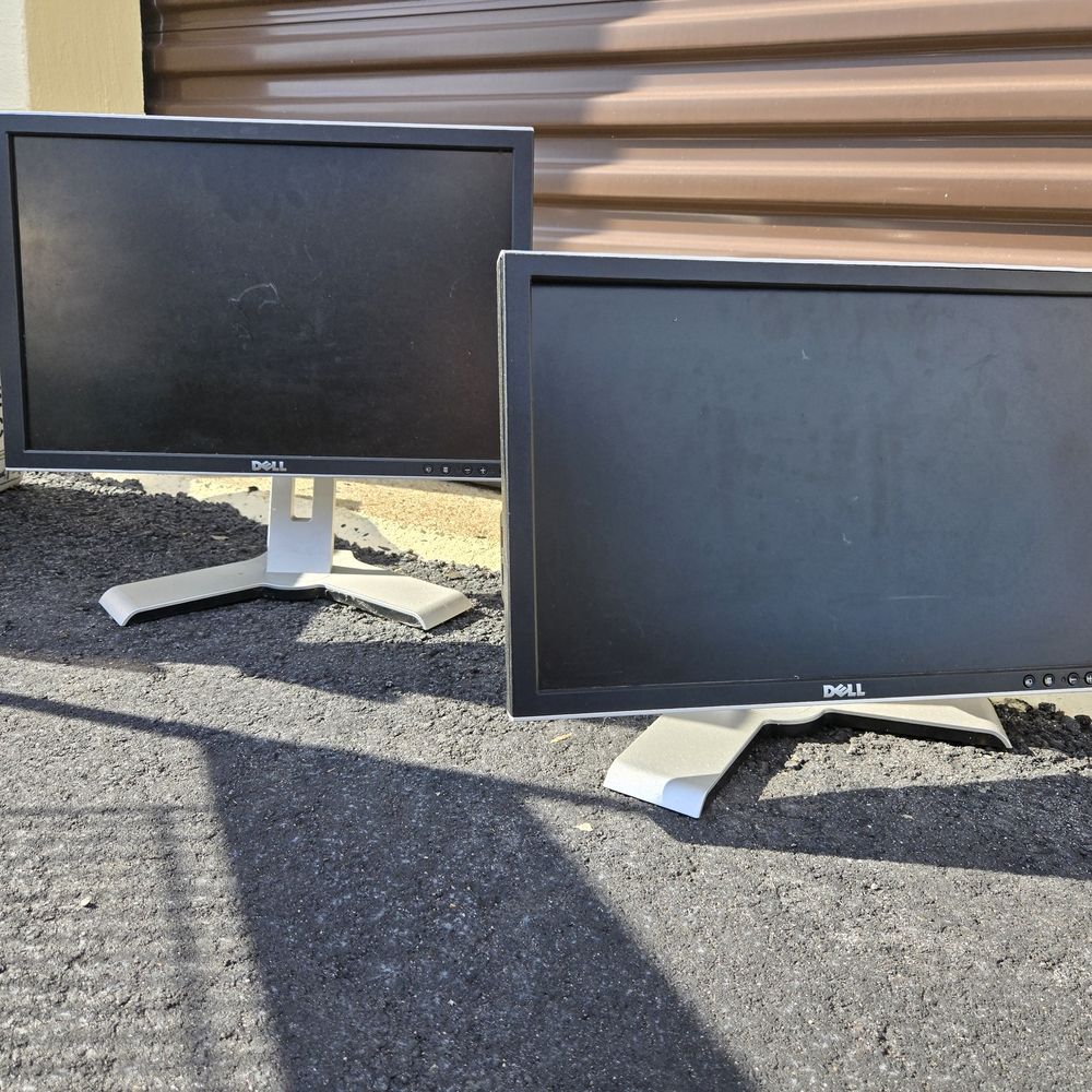 Dell Dual Black Monitors with Silver Stands